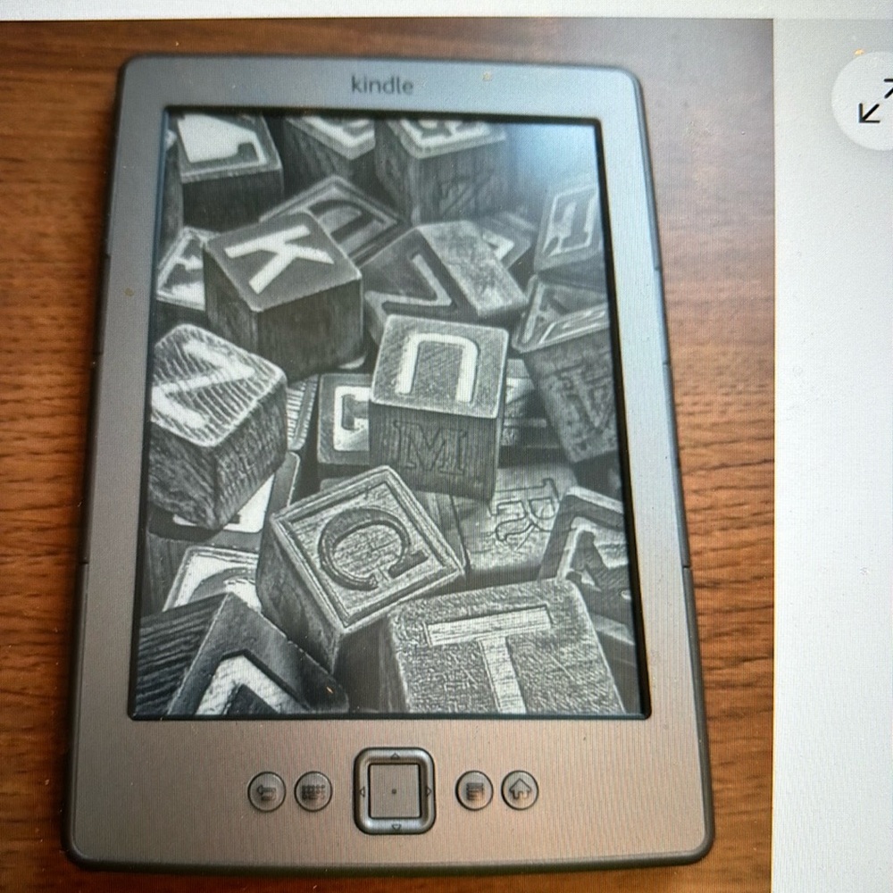 Amazon Kindle 4th Generation 2GB 6” DO1100 eBook Reader with Charging Cord